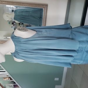 Sleeveless with shorts.